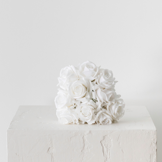 Medium White Rose Bridal Bouquet on display